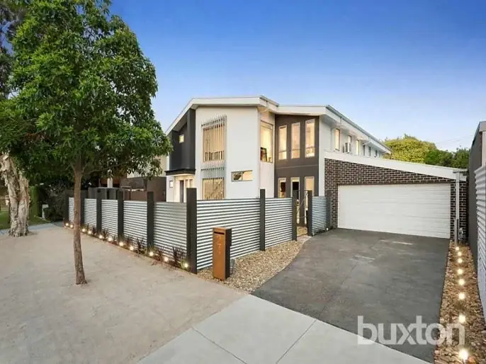 Nepean Avenue Residence — two-storey residence with a broad driveway and double garage